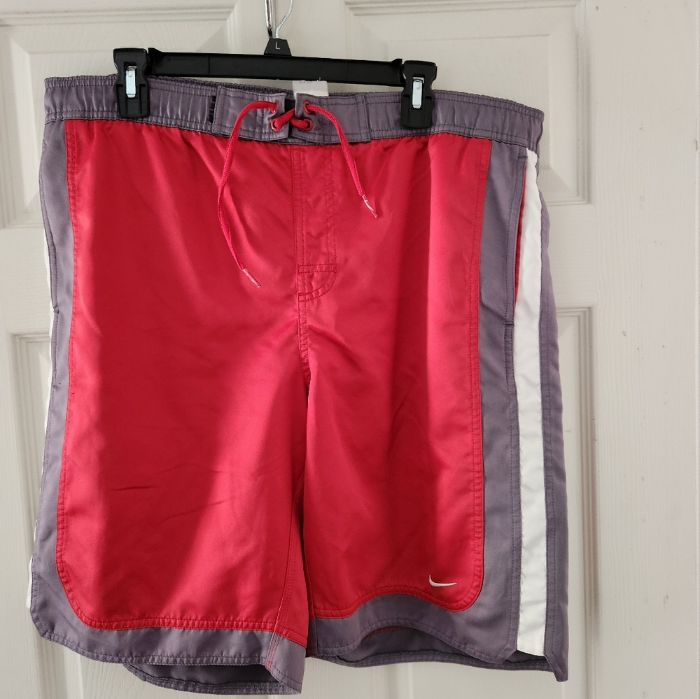 Men's NIKE swim trunks.